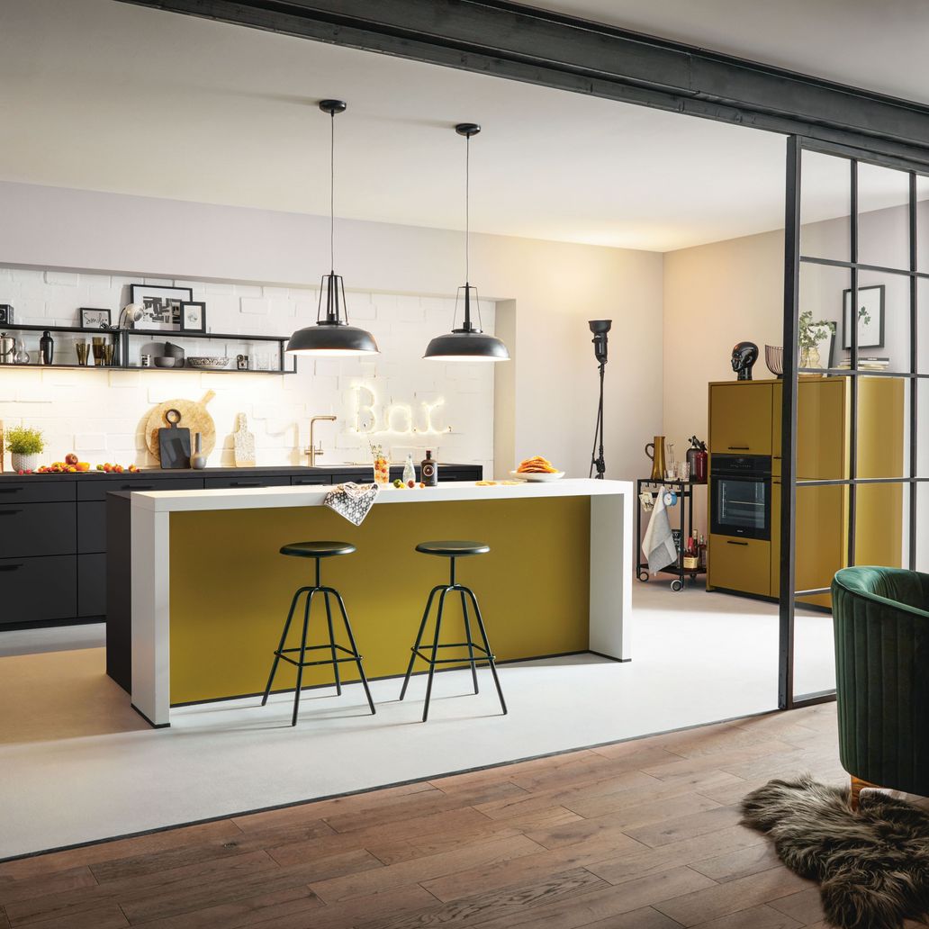 yellow kitchen island with bar