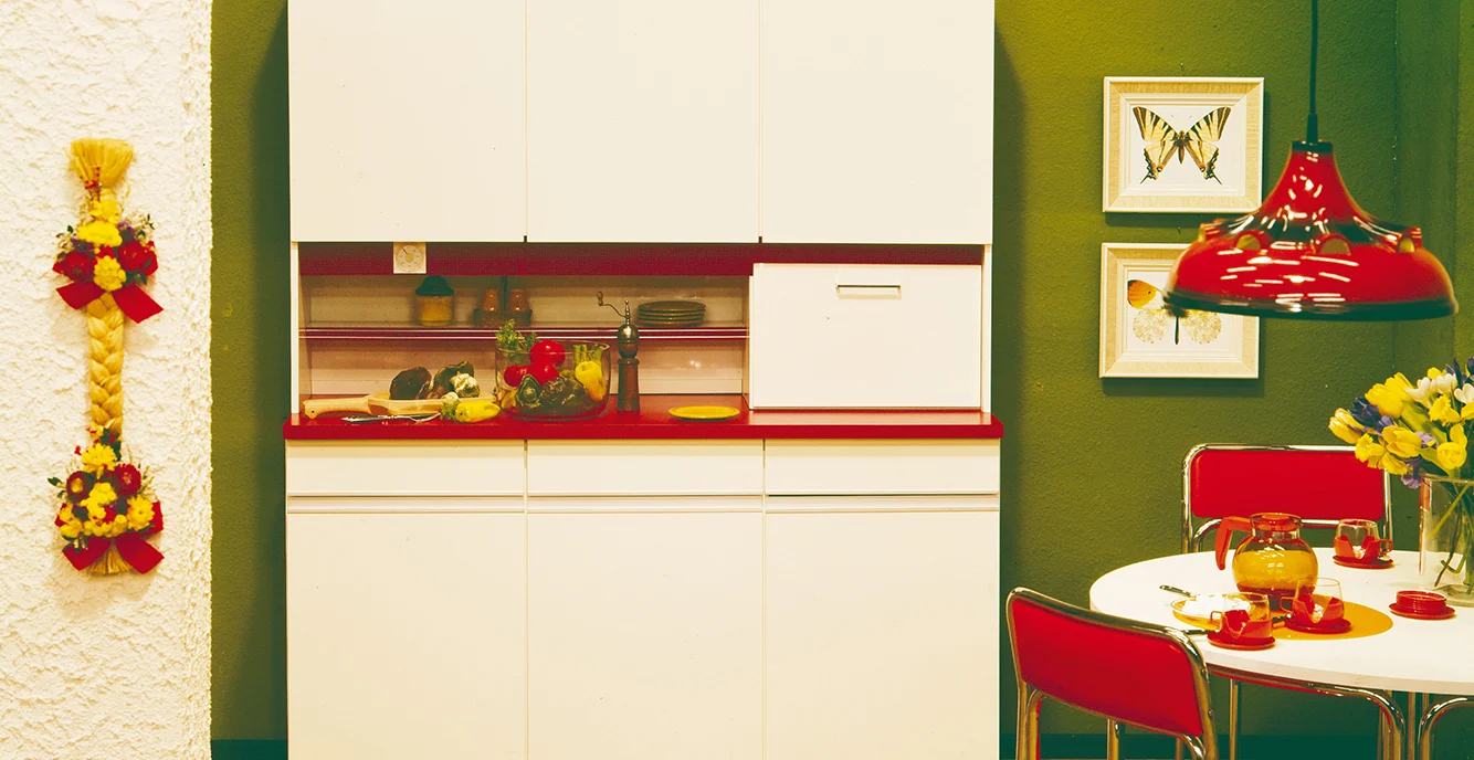 Kitchen with a working counter and a table